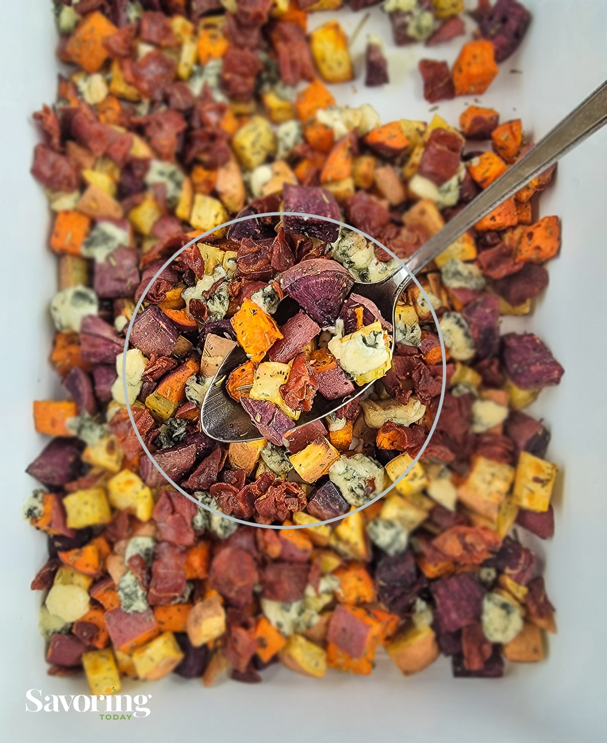 roast sweet potato dish with a circle highlight in the middle and background blurred