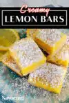 lemon bars stacked on a plate with a title banner