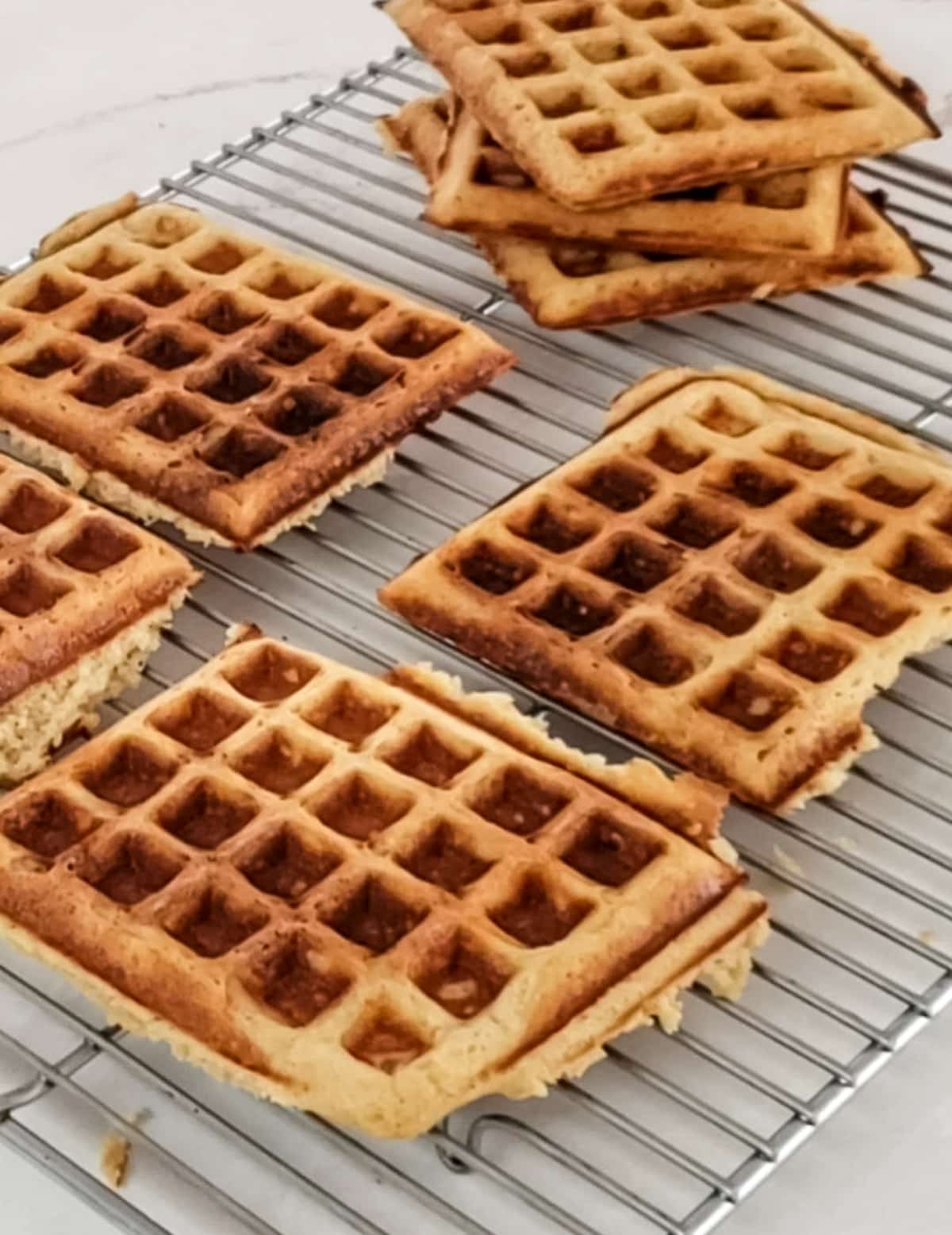 waffles cooling on a rack