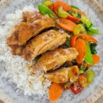 teriyaki chicken, vegetables, and rice on a plate