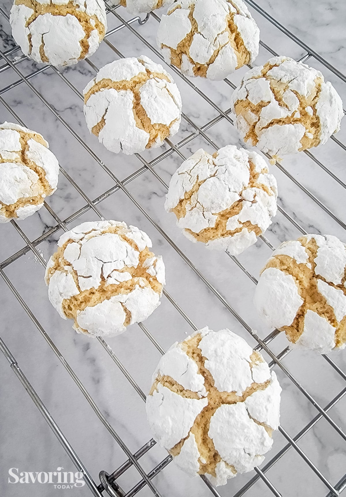 lemon crinkle cookies on a wire rack