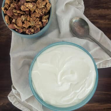 homemade Greek yogurt on a table with granola