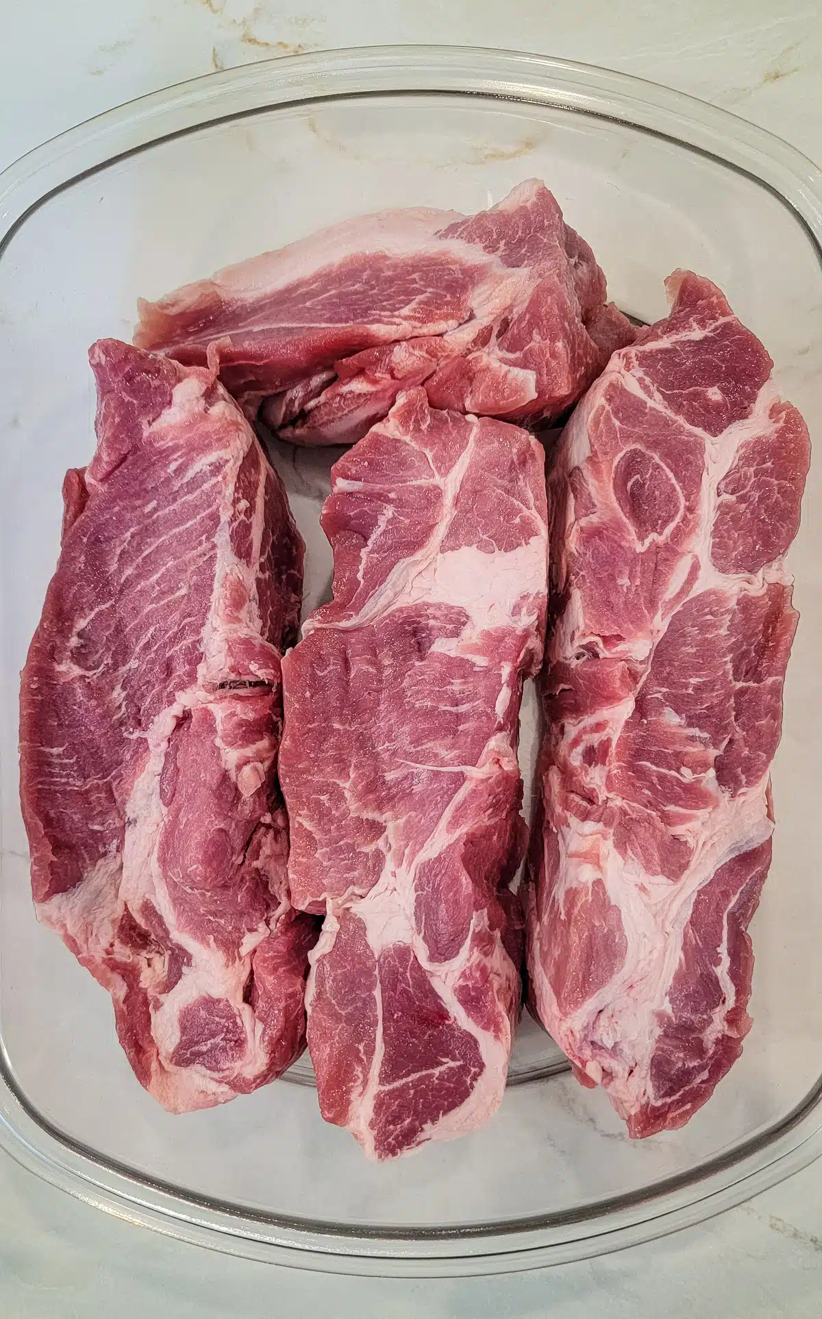country style pork ribs in a glass dish