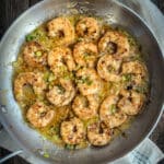chili crunch grilled shrimp in saucepan with miso butter sauce