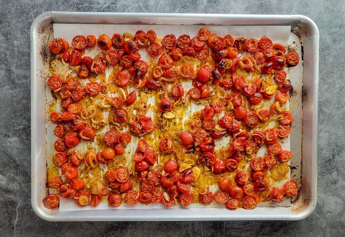 roasted tomato, shallot, garlic medley on a pan fresh from the oven