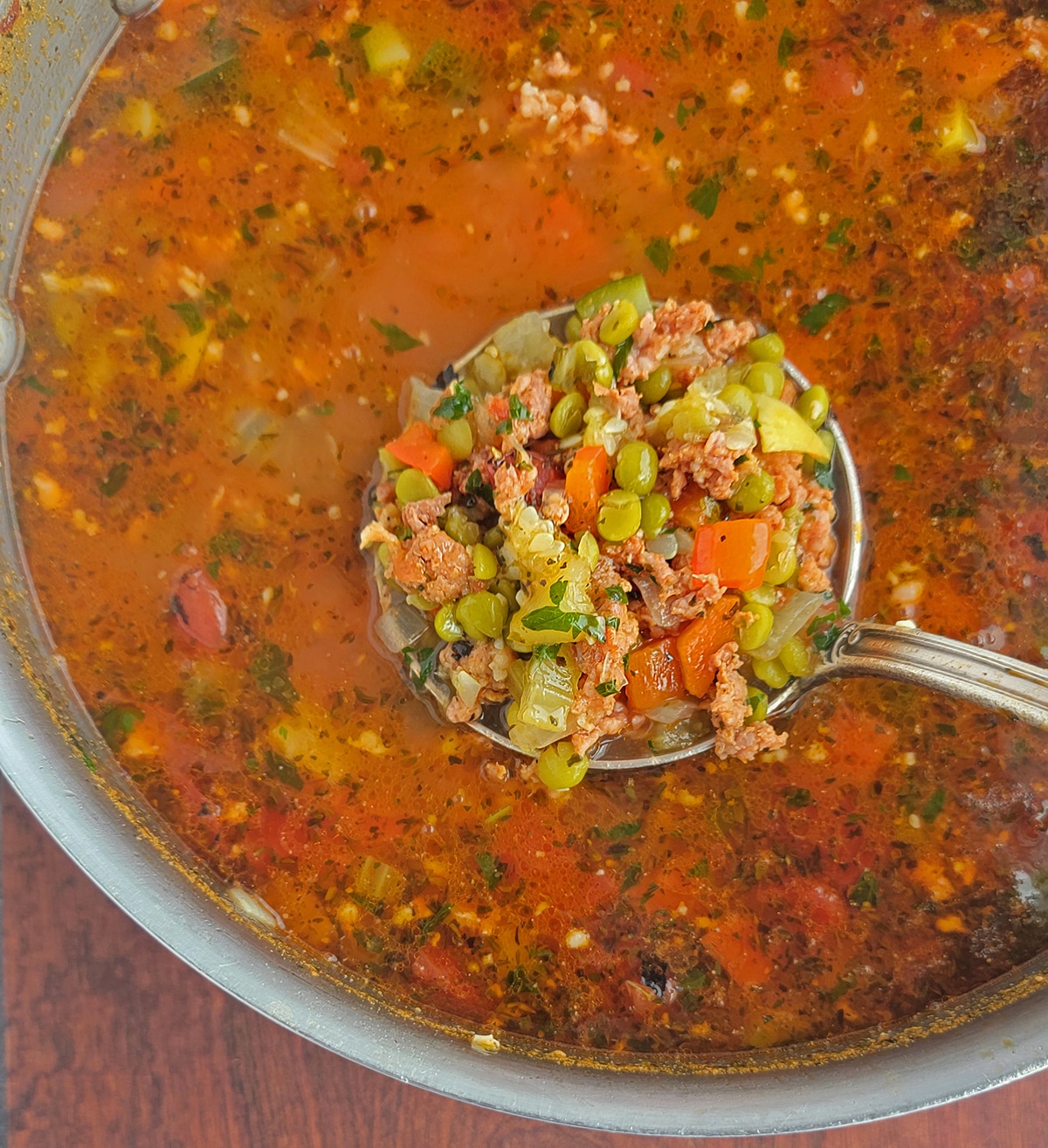 split pea soup with Italian sausage ladled up