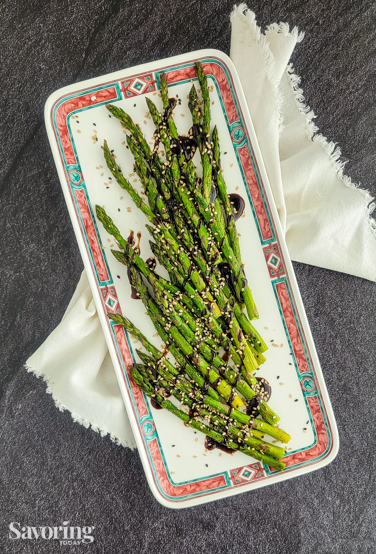 Hoisin glazed roasted aparagus on a platter