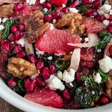Winter citrus salad close up in a white bowl