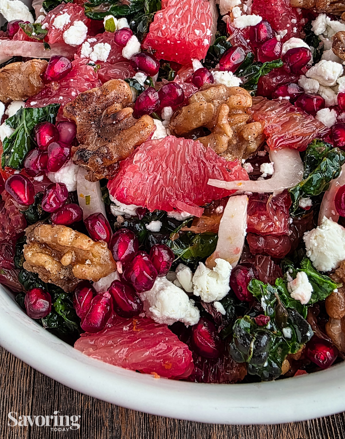 Winter citrus salad close up in a white bowl